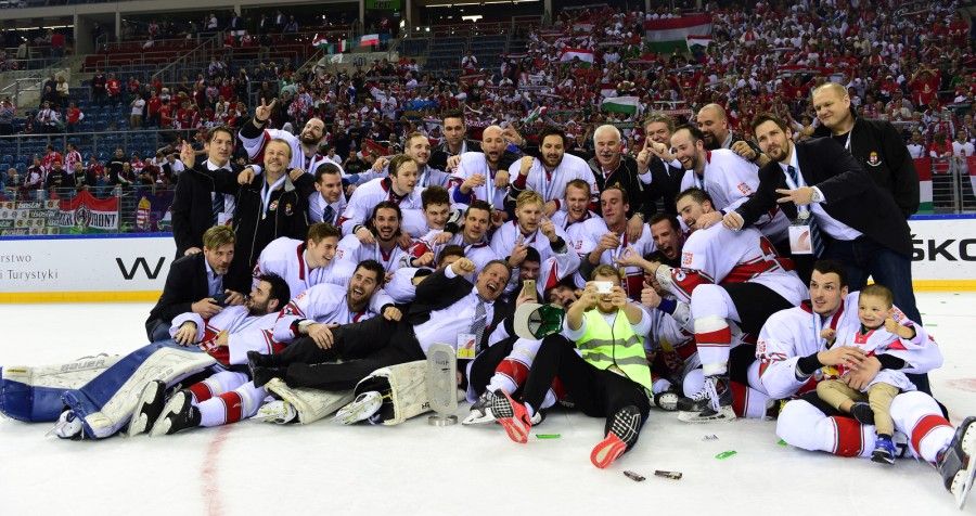 The Hungarian team poses for a team photo after reaching second place and promotion at the 2015 IIHF Ice Hockey World Championship Division I Group A. Photo: Miroslaw Ring