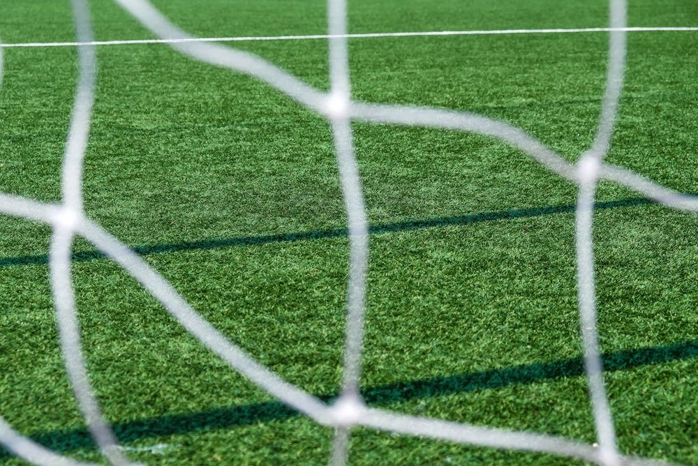 Soccer,Field,Green,Grass,And,Net,Background.,Football,Or,Soccer